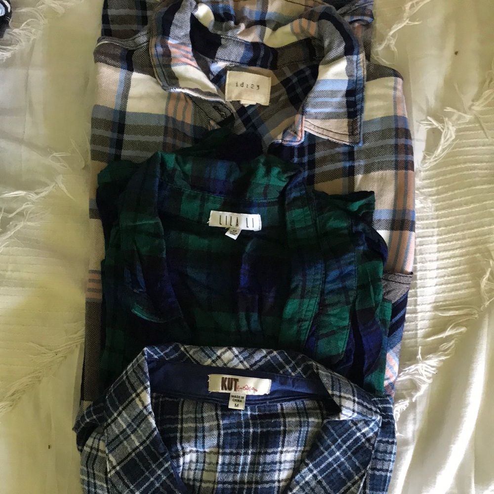 Bundle of women’s plaid button downs
